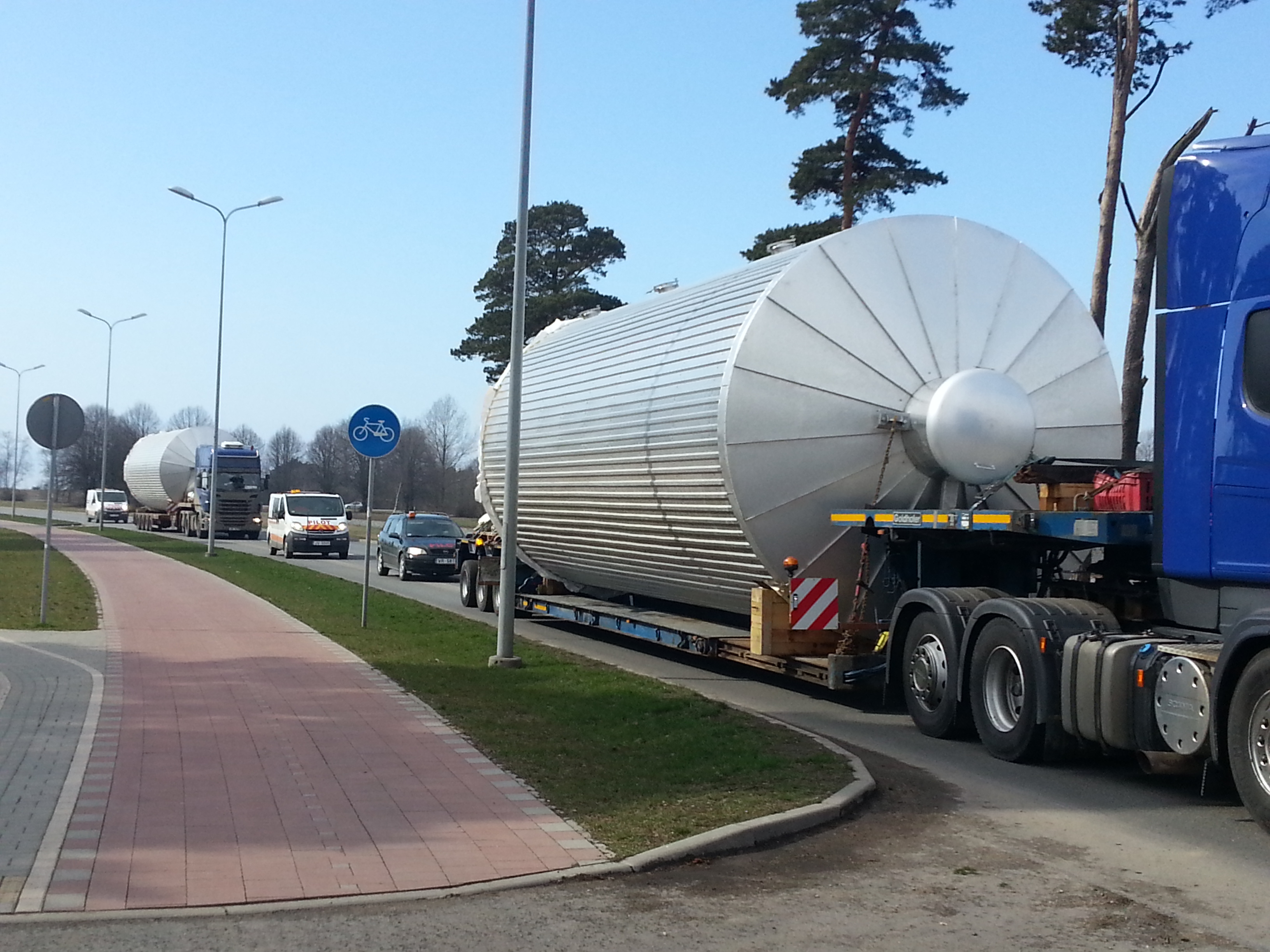 Oversized silo convoy on road